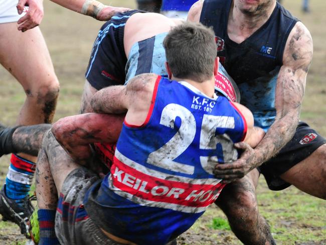 Brett Stillman lays a big tackle for Keilor. Picture: Jamie Morey