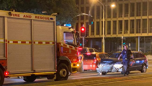 Emergency services responding to a traffic crash at the corner of Stanley and Sturt street in Townsville's CBD on Friday night.