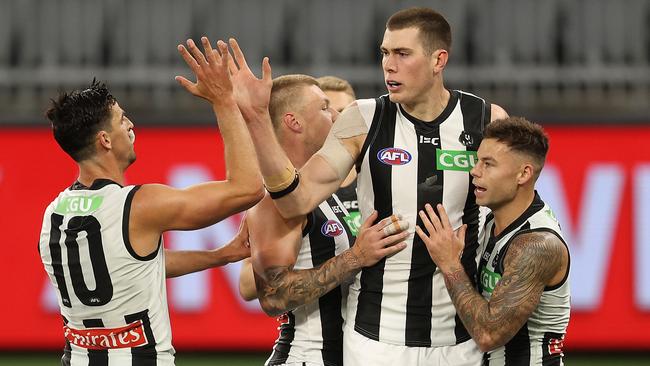 Mason Cox celebrates one of three first quarter goals. Picture: Getty Images