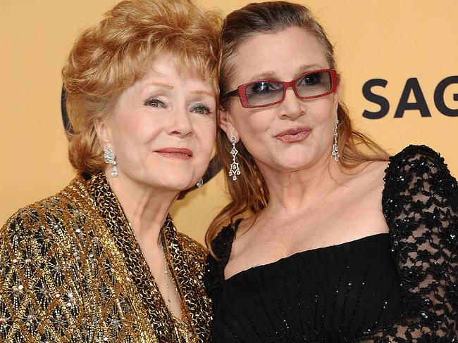 Actresses Debbie Reynolds (left) the mother of Carrie Fisher has been rushed to hospital according to reports. Picture: Jason LaVeris/FilmMagic