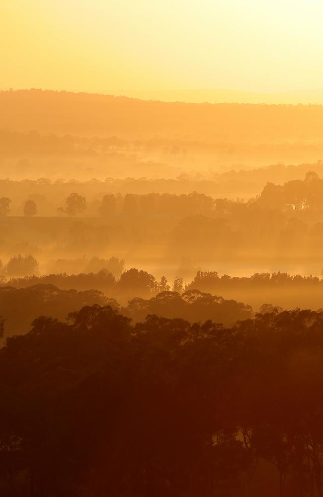 Morning mist over Pokolbin in the NSW Hunter Valley, as seen from one of the area’s popular hot air balloon rides. Picture: Troy Snook