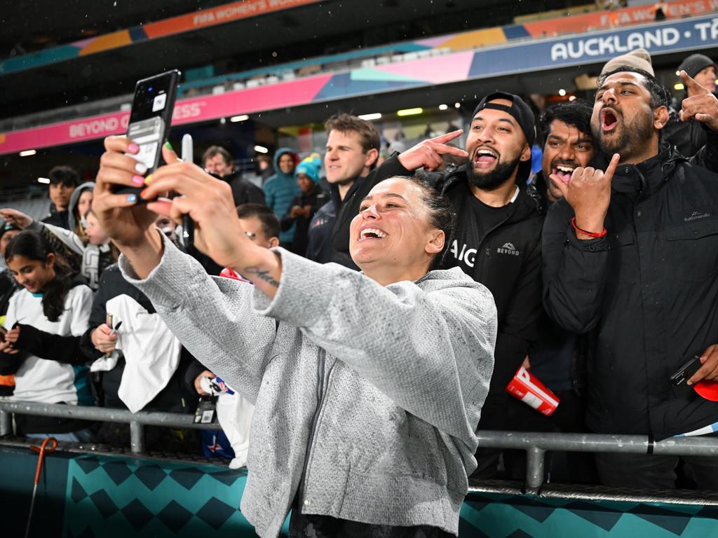 Captain Ali Riley of New Zealand takes a selfie with fans after the team's 1-0 victory against Norway in the opening game of the Women’s World Cup in Auckland. Picture: Hannah Peters/Getty Images