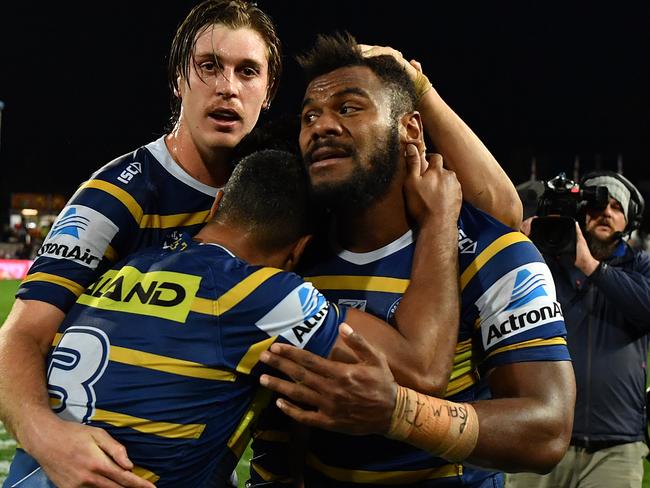 Maika Sivo of the Eels celebrates a turnover with teammates during the Round 20 NRL match between the St George Illawarra Dragons and the Parramatta Eels at Netstrata Jubilee Stadium in Sydney, Sunday, August 4, 2019. (AAP Image/Joel Carrett) NO ARCHIVING, EDITORIAL USE ONLY