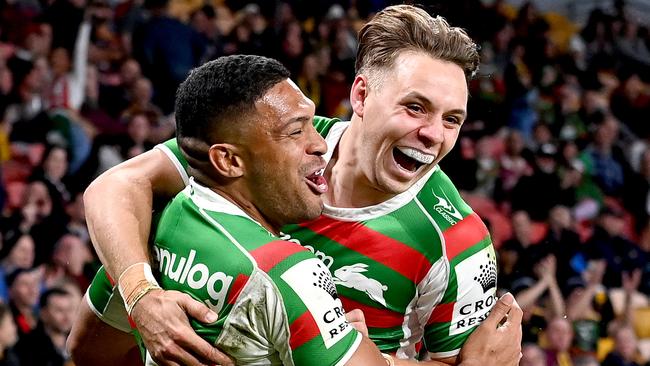 BRISBANE, AUSTRALIA - JUNE 17: Taane Milne of the Rabbitohs celebrates with team mate Blake Taaffe after scoring a try during the round 15 NRL match between the Brisbane Broncos and the South Sydney Rabbitohs at Suncorp Stadium, on June 17, 2021, in Brisbane, Australia. (Photo by Bradley Kanaris/Getty Images) *** BESTPIX ***