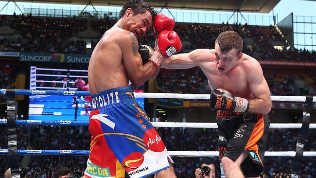Jeff Horn punches Manny Pacquiao en route to the WBO World Welterweight title. Photo: Getty Images