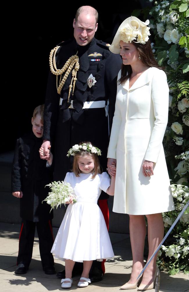 Prince William and Kate Middleton with their children Prince George and Princess Charlotte at Meghan and Harry’s wedding. Picture: Andrew Matthews – WPA Pool/Getty Images