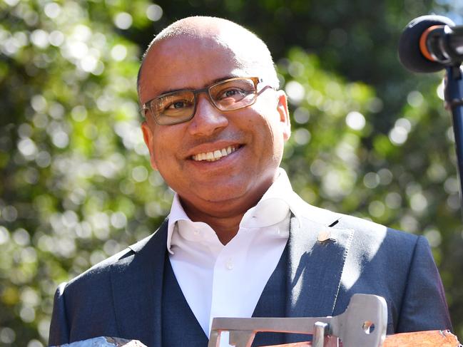 GFG Alliance executive chairman Sanjeev Gupta (with Mark Mentha, right) holds the keys to his new business at an event marking the official handover of Arrium's steel and mining operations across Australia to the GFG Alliance at the Whyalla steelworks in Whyalla, South Australia, Friday, September, 1, 2017. (AAP Image/David Mariuz) NO ARCHIVING