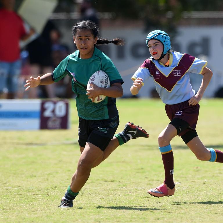 Under-12 girls' state league titles at Burleigh juniors fields Met North V South Coast. Met North's Raewyn Olomalii. (Photo/Steve Holland)