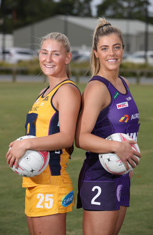 Annie Miller from Sunshine Coast lightning and Lara Dunkley from Firebirds ready for action in the Super netball pre-season tournament the Team Girls Cup. Picture Glenn Hampson