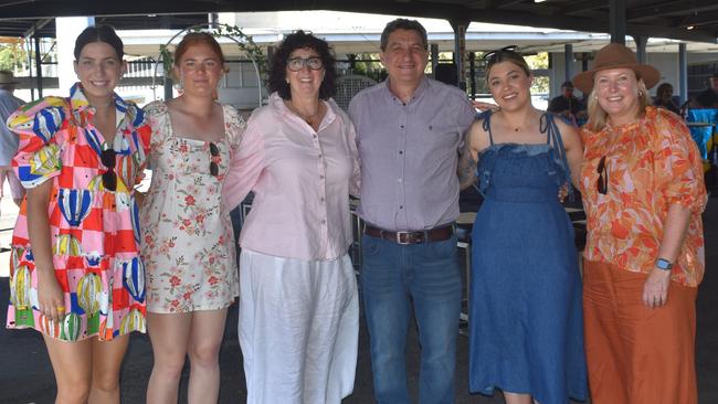 Ella Sandilands, Poppy Sandilands, Grea Sandilands, Andre Luciano, Nardia Falzon and Amanda Sandilands at the Rockhampton Jockey Club's Pink Ribbon Stradbroke Charity Race Day at Callaghan Park on June 15, 2024.