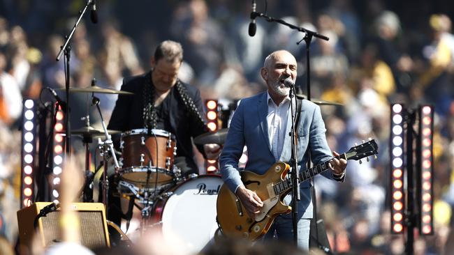 Paul Kelly performs before during the 2019 AFL Grand Final match at the MCG, 2019. Photo: Ryan Pierse/AFL Media/via Getty Images