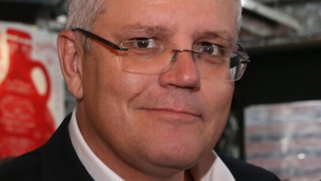Treasurer Scott Morrison is expected to announce a slash in income tax. Picture: News Corp Australia