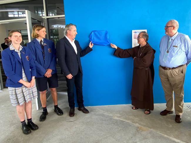 Page MP Kevin Hogan with Trinity Catholic College principal Brother John Hilet and other Trinity representatives at the opening of the new TAS Building.