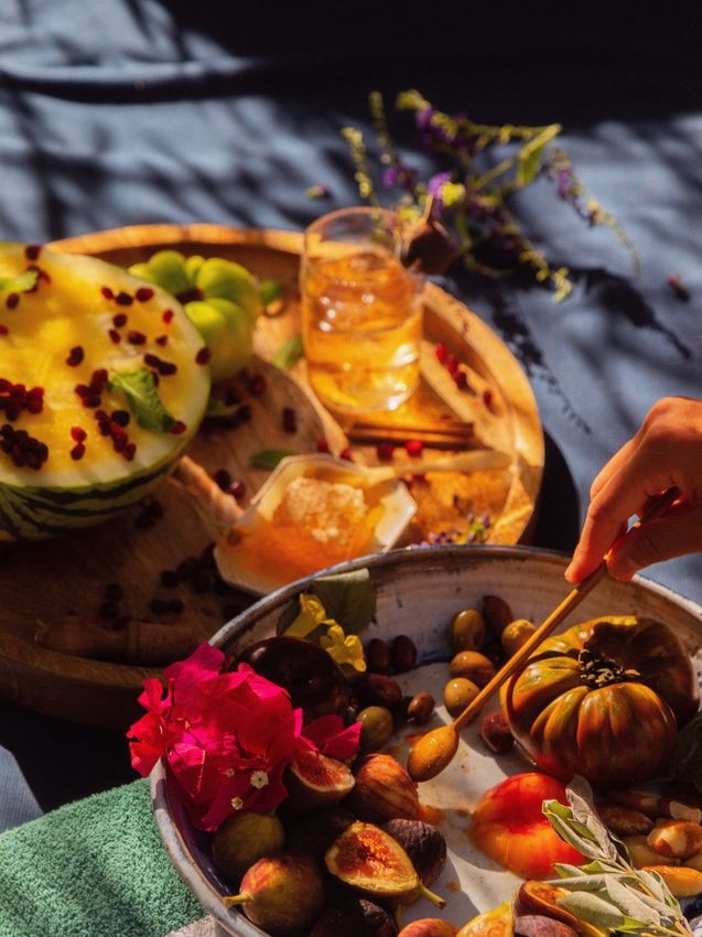 Poolside snacks—yellow watermelon and figs—at Two Bunch Palms. Picture: Stephanie Pia