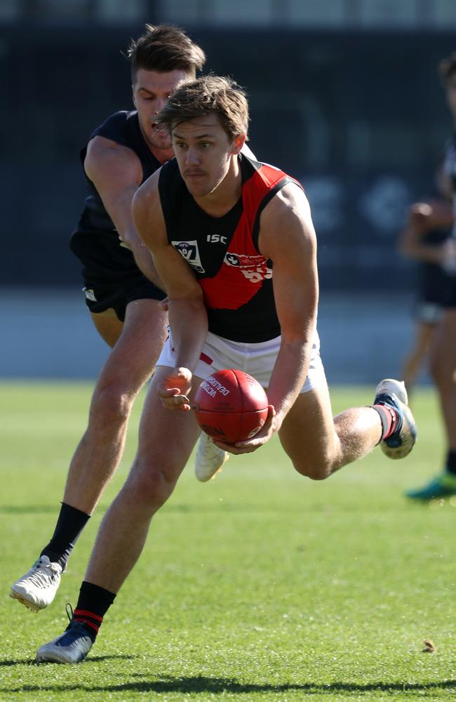 Aaron Heppell takes possession against Northern Blues. Picture: Mark Dadswell.