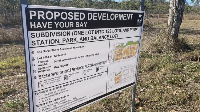 Public consultation signage on the fence line of the Mount Low cattle paddock.