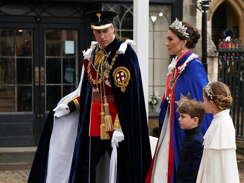 The Princess of Wales stunned at Westminster Abbey in an ivory Alexander McQueen dressed, and daughter Princess Charlotte matched. Picture: Paul ELLIS / AFP