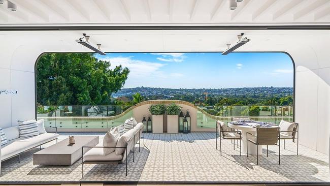 The 18m-long entertaining terrace has harbour views towards Rose Bay. Picture: realestate.com.au