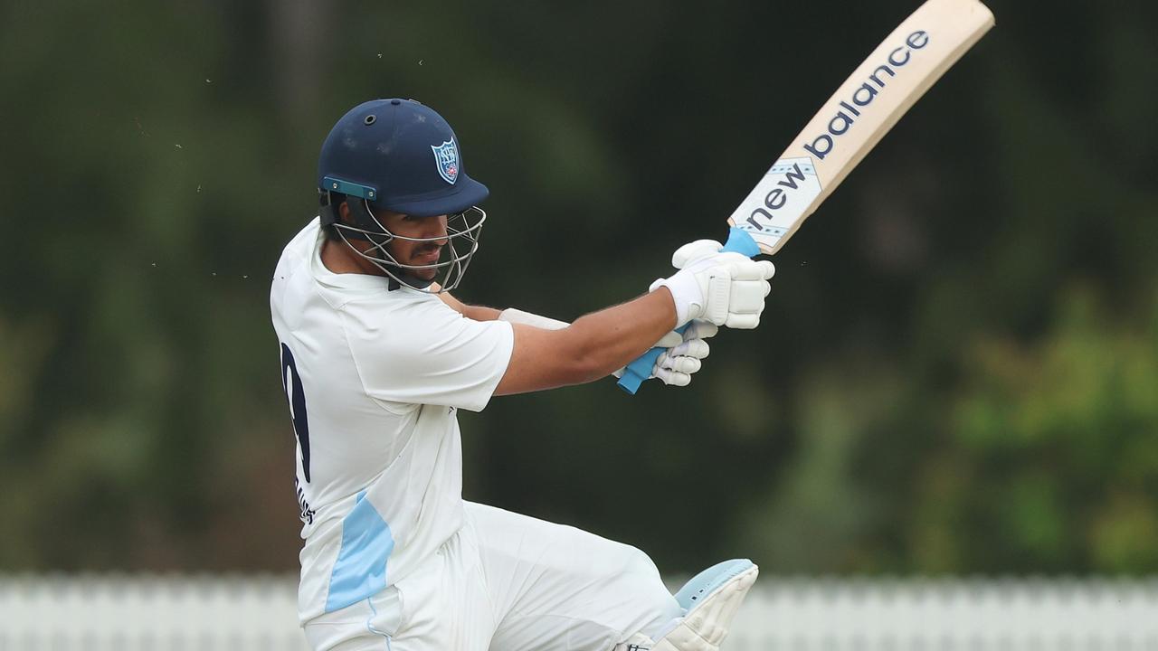 Exciting right-hander Ollie Davies fell just short of a hundred as NSW and Queensland drew their rain-affected match at Cricket Central on Monday. Picture: Mark Metcalfe / Getty Images