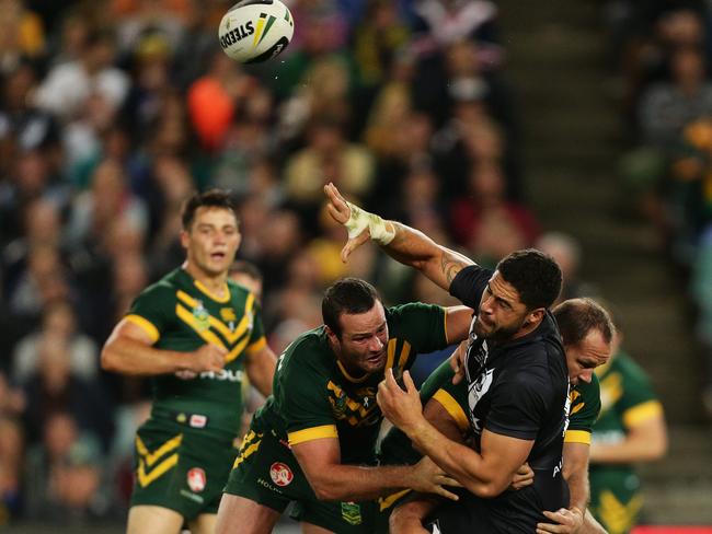 New Zealand's Jesse Bromwich gets a pass away during a Test Match against Australia. Pic Brett Costello