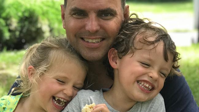 Former US marine pilot Daniel Duggan with two of his six children. ‘My children are very, very sad’, said his wife, Saffrine. Picture: News Corp