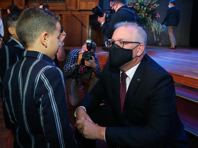 Michael Abdallah, son of Leila Abdallah and Abdallah, chatting with Prime Minister Scott Morrison on Sunday. Picture Gaye Gerard/NCA Newswire.