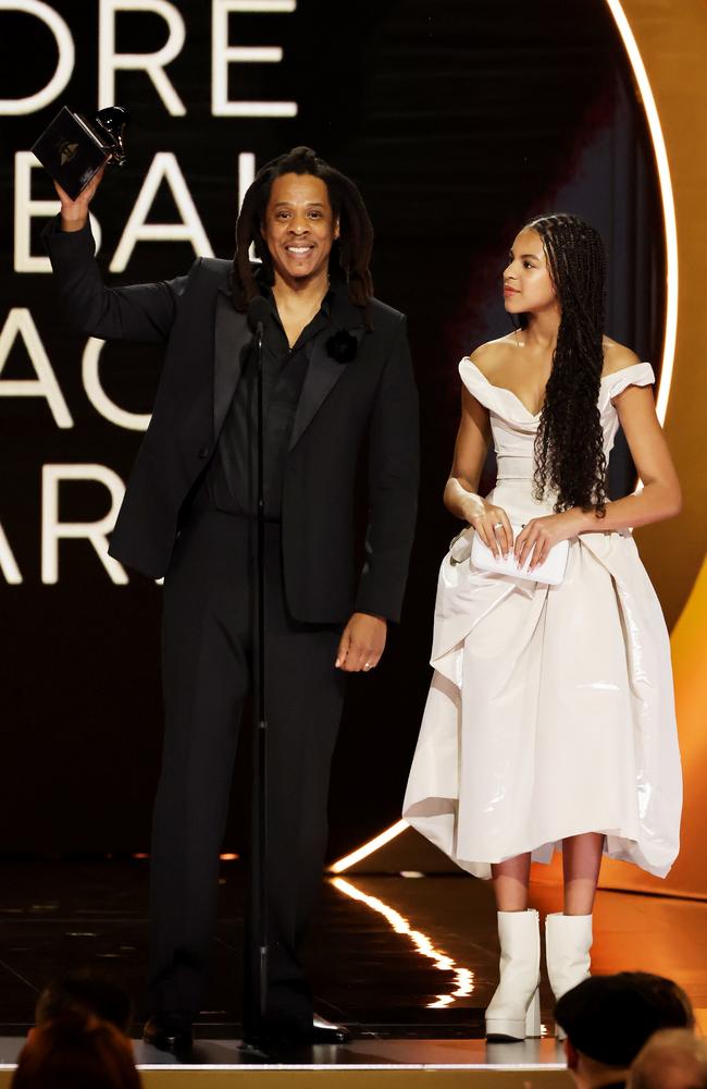 Honoree Jay-Z accepts the Dr. Dre Global Impact Award with daughter Blue Ivy Carter at the Grammys. Picture: Getty Images