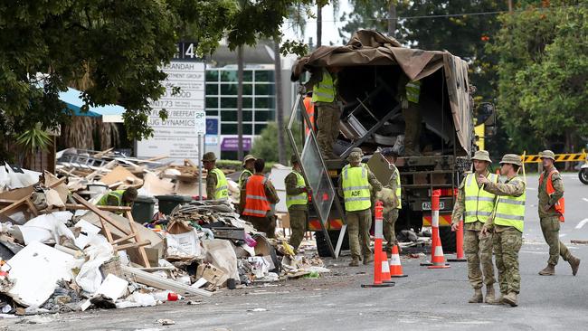 ADF personnel clean up flood damage in Milton in March last year. Picture: Getty Images