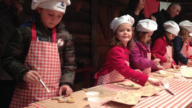 Sweet treats ... Children prepare cookies to leave out for Santa on Christmas Eve. Picture: Supplied