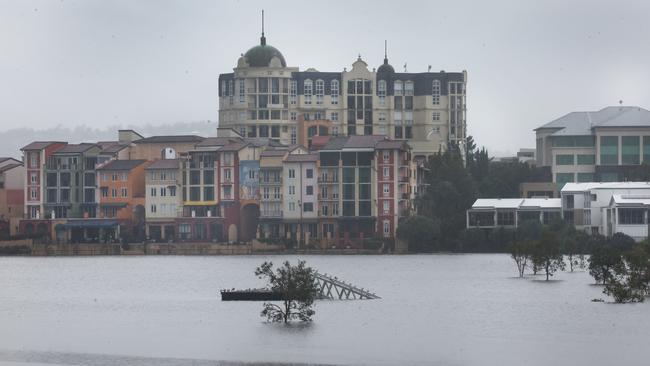 Flooding on the Gold coast in the aftermath of Cyclone Alfred. Emerald Lakes and Carrara go under. Picture Glenn Hampson