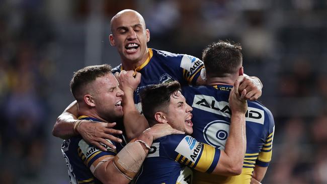 *APAC Sports Pictures of the Week - 2020, March 16* - SYDNEY, AUSTRALIA - MARCH 12: Reed Mahoney of the Eels celebrates scoring a try with team mates during the round 1 NRL match between the Parramatta Eels and the Canterbury Bulldogs at Bankwest Stadium on March 12, 2020 in Sydney, Australia. (Photo by Mark Metcalfe/Getty Images)