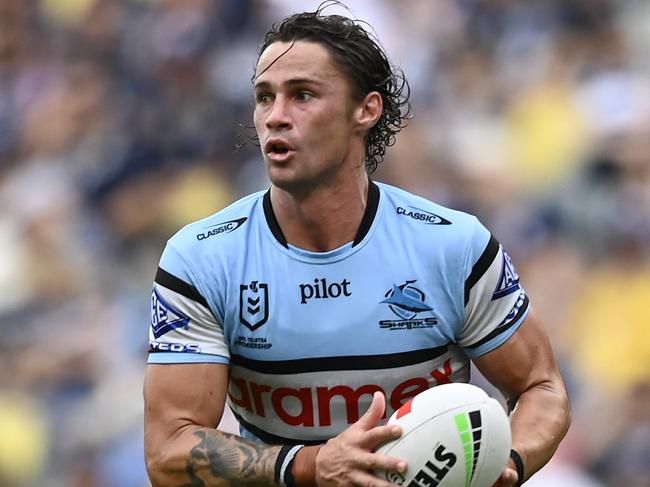 TOWNSVILLE, AUSTRALIA - MARCH 15: Nicho Hynes of the Sharks scores a try during the round two NRL match between North Queensland Cowboys and Cronulla Sharks at Queensland Country Bank Stadium, on March 15, 2025, in Townsville, Australia. (Photo by Ian Hitchcock/Getty Images)