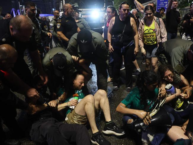 Chaos in the streets after the release of four Israeli hostages. Picture: AFP