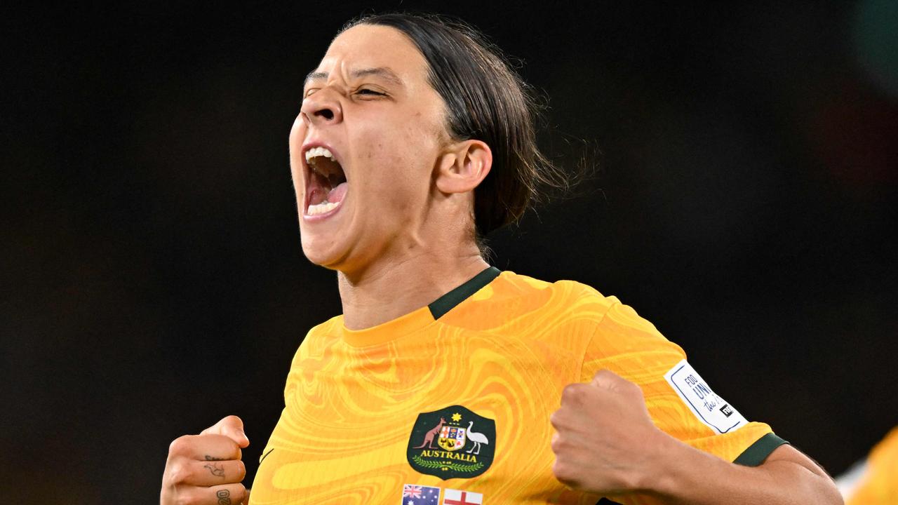 Australia's forward #20 Sam Kerr celebrates scoring her team's first goal during the Australia and New Zealand 2023 Women's World Cup semi-final football match between Australia and England at Stadium Australia in Sydney on August 16, 2023. (Photo by Izhar KHAN / AFP)