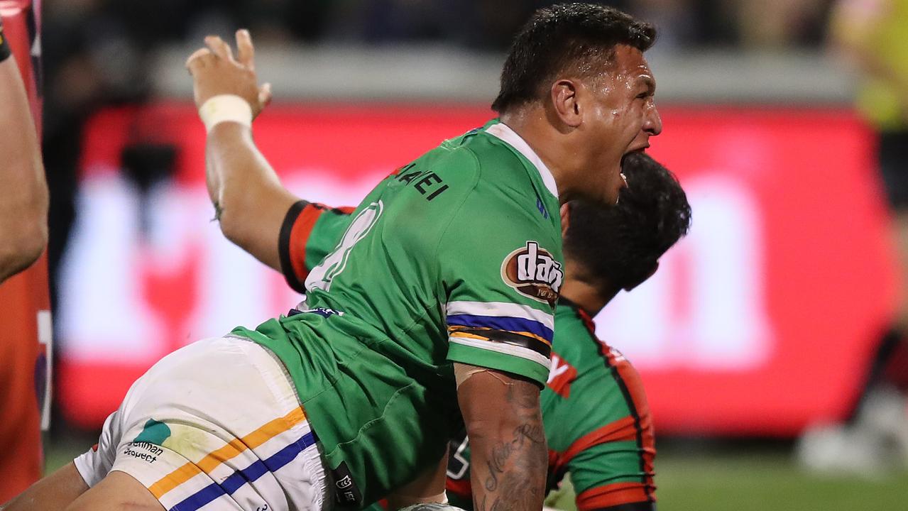 Canberra's Josh Papalii scores a try to win the preliminary final.