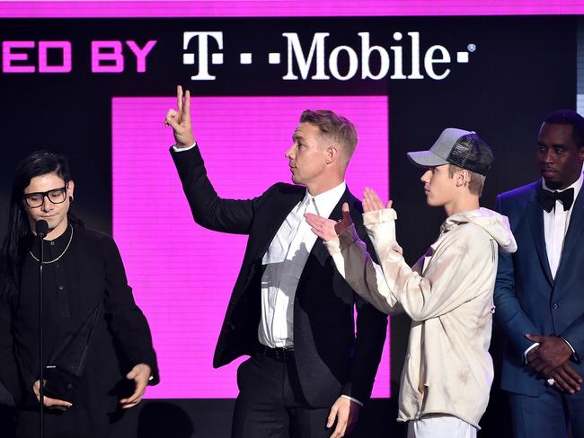 Musicians Skrillex, Diplo and Justin Bieber accept Collaboration of the Year award for 'Where Are U Now' from recording artist Sean 'Diddy' Combs in 2015. Picture: Getty Images