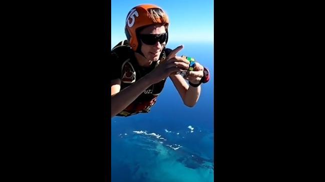 Aussie teen breaks Rubik's cube world record while skydiving