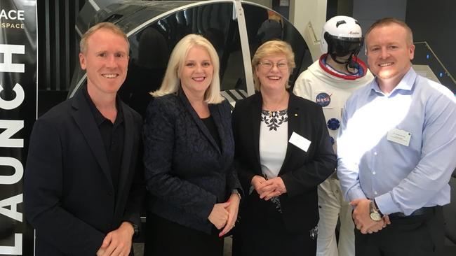 Adam Gilmour, Minister for Industry, Science and Technology Karen Andrews, head of the new Australian Space Agency Dr Meghan Clark and James Gilmour with Gilmour's Mercury capsule replica at the 18th Australian Space Research Conference at the Mantra on View Hotel in Surfers Paradise.