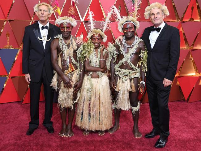 Nominees for Best Foreign Language Film Tanna pose as they arrive on the red carpet. Picture: AFP