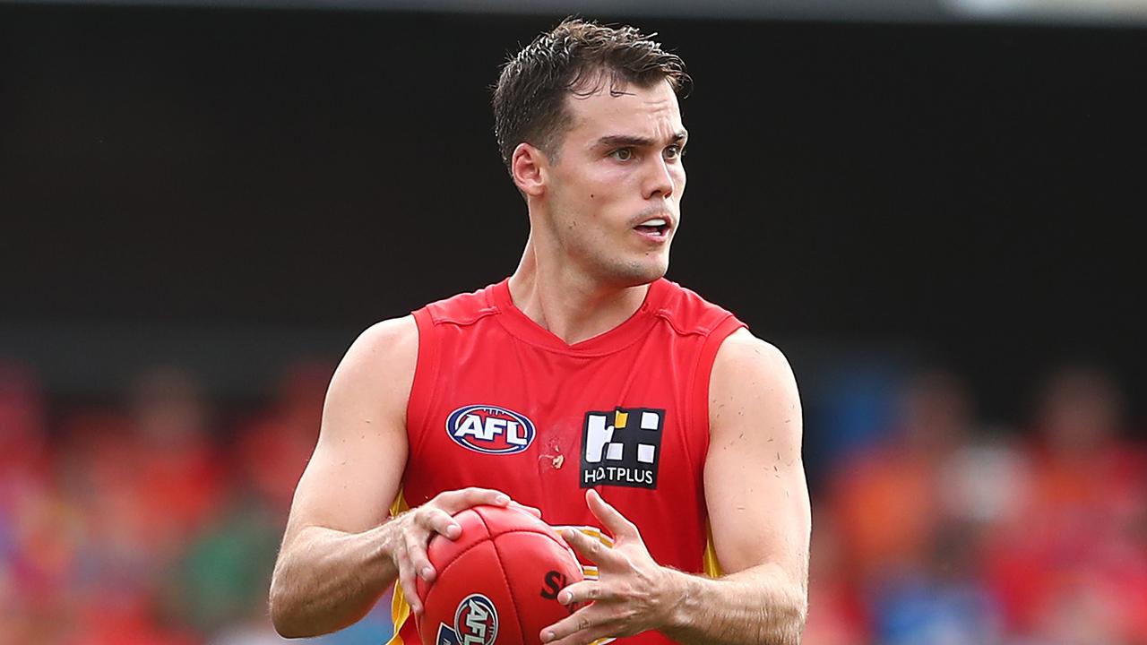 GOLD COAST, AUSTRALIA - MAY 08: Jack Bowes of the Suns kicks during the round eight AFL match between the Gold Coast Suns and the St Kilda Saints at Metricon Stadium on May 08, 2021 in Gold Coast, Australia. (Photo by Chris Hyde/Getty Images)