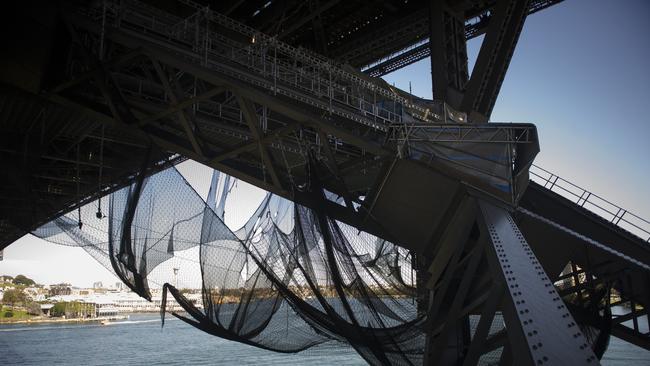 Nets designed to catch falling equipment hang under a paint station. Photos: Chris McKeen