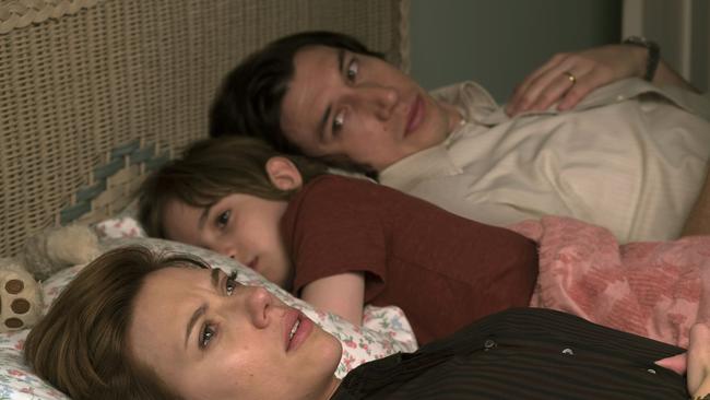 This image released by Netflix shows Scarlett Johansson, left, and Adam Driver in "Marriage Story." (Netflix via AP)