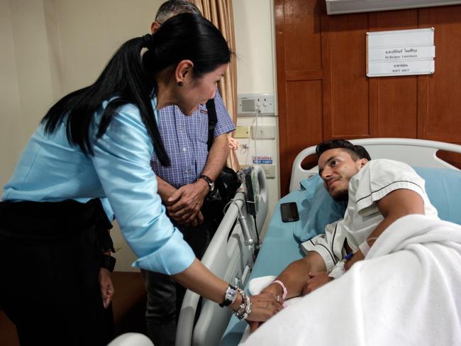 Thai Minister for Tourism and Sports Kobkarn Wattanavrangkul meets bombing victim, Italian tourist Lorenzo Minuti, at Sanpaulo hospital. Picture: Dario Pignatelli/Getty Images)