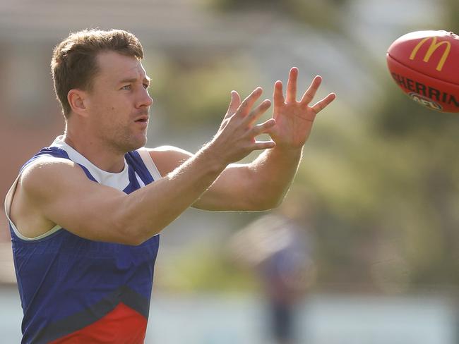 MELBOURNE, AUSTRALIA - MARCH 20: Jack Macrae of the Bulldogs in action during a Western Bulldogs AFL training session at Whitten Oval on March 20, 2024 in Melbourne, Australia. (Photo by Daniel Pockett/Getty Images)