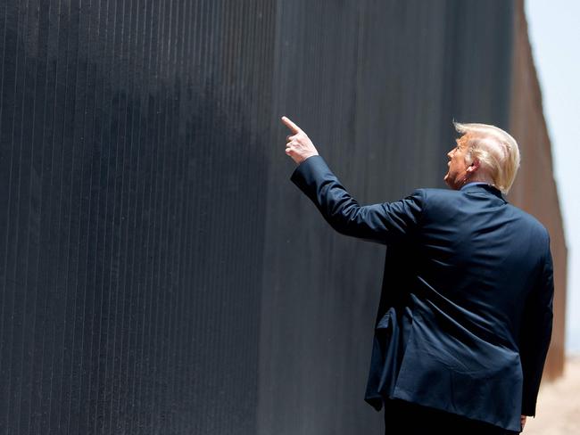 AFP presents a retrospective photo package of 60 pictures marking the 4-year presidency of President Trump.  US President Donald Trump participates in a ceremony commemorating the 200th mile of border wall at the international border with Mexico in San Luis, Arizona, June 23, 2020. (Photo by SAUL LOEB / AFP)