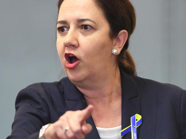 Queensland Premier Annastacia Palaszczuk gestures during question time on the floor of the Queensland Parliament in Brisbane, Thursday, May 3, 2018.  (AAP Image/Dave Hunt) NO ARCHIVING