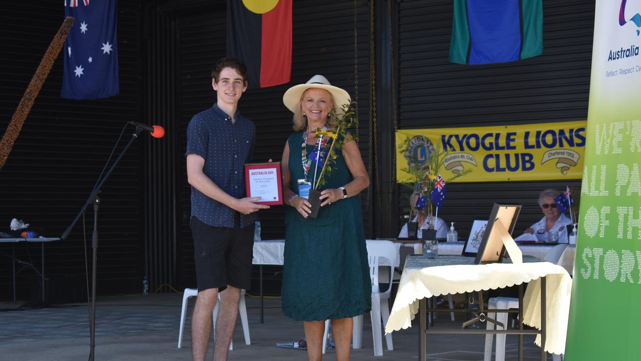 Australia Day ambassador Lyndey Milan presents the Senior Student of the Year award to Ashton Leck at the 2021 Kygole Australia Day ceremony.