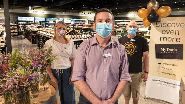 Store manager, Owen Scotchbrook (centre), with customer assistants Zoe Cross and Pete Stewart at the new Dan Murphy's bottle shop at Frenchs Forest. Picture: Supplied