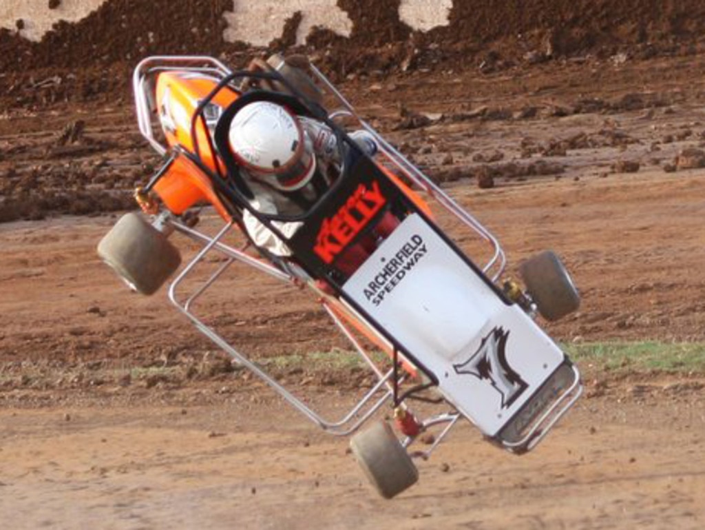 Springwood’s Aaron Kelly had the ride of his life when he flipped his car during a Junior Quarter Midget race at Brisbane International Speedway at Archerfield. Photo: Supplied