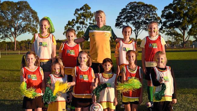 YEH THE GIRLS: Sandii Barsby (centre) is one of 126 community leaders working to bring the Women's Football World Cup to Australia. She is pictured with Jemima Ball, Abigail Holgate, Daria Box, Alena Dibben, Tyrah Dibben and Elexis Jarius, Madelyn McGowan, Abigail Adams, Ava O'Connell and Shelby Box. Picture: Cody Fox